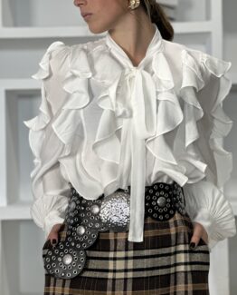 Blusa volantes y lazada blanca